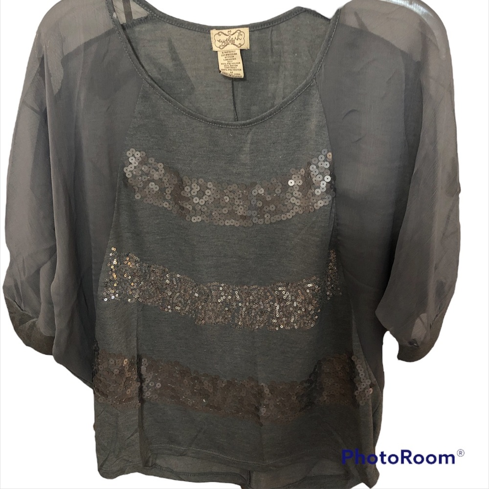 Eyelash Couture sheer dolman sleeve top with sequin accents.  NWOT size medium.